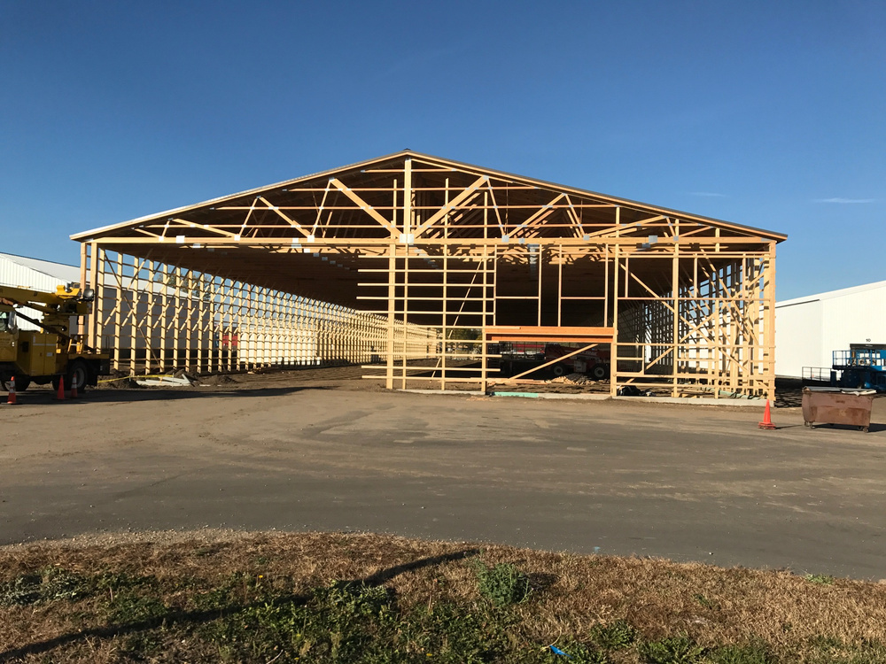 Framing and roof structure of the new Stang Precision building under construction