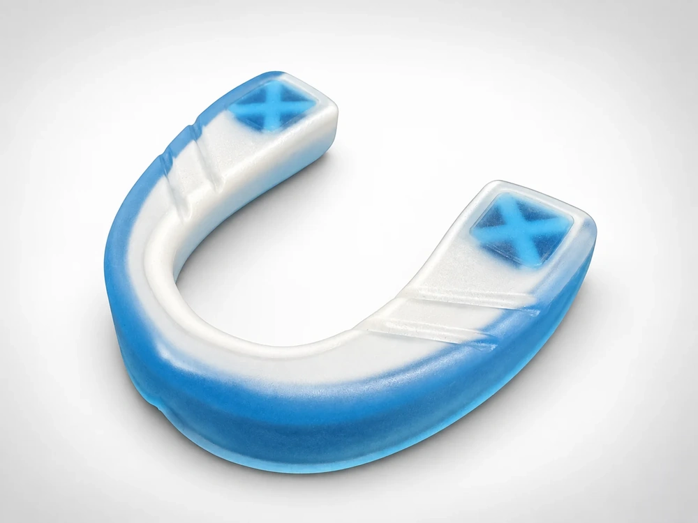 Blue and white multi-shot molded component